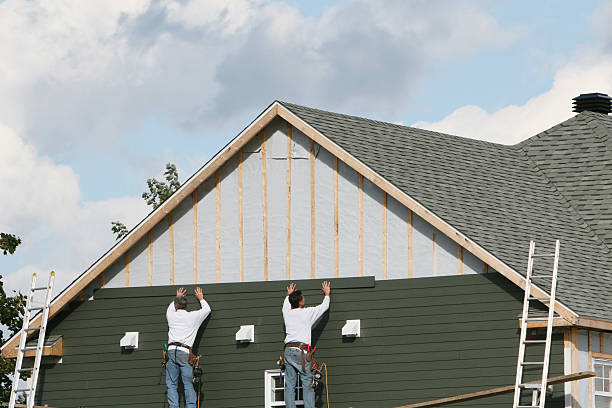 Professional Siding Installation technician working in Piqua, OH